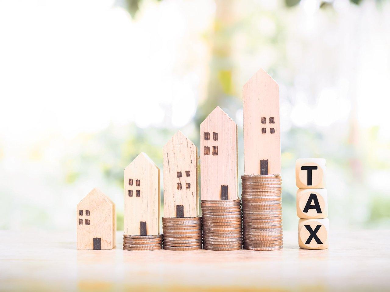 Comprendre la taxe foncière : propriétaires concernés et calcul détaillé