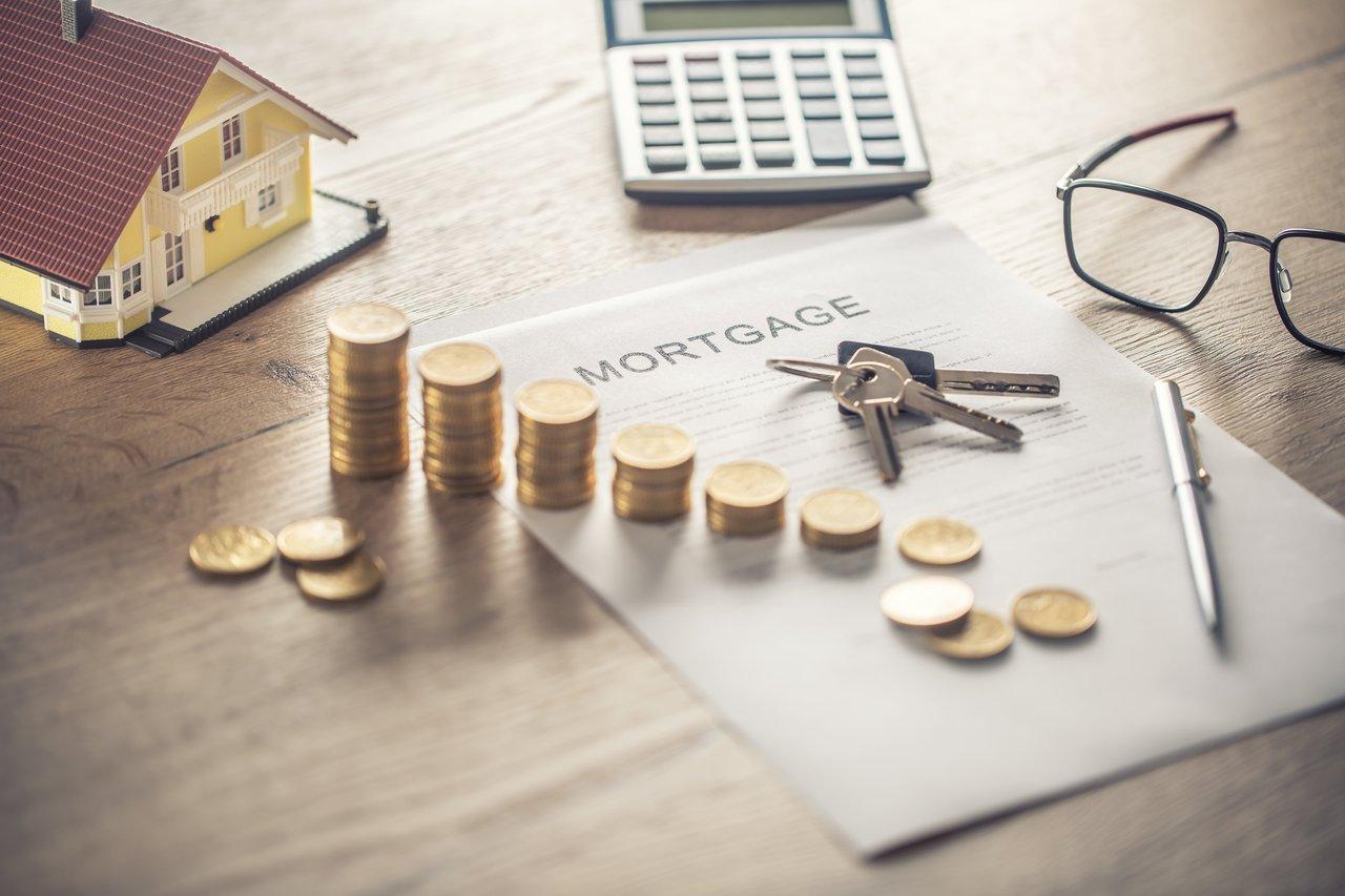 Graphique comparatif illustrant le coût total d'un mortgage loan comparison chart avec différé partiel et total pour primo-accédants.