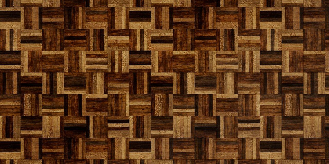 Sol en parquet massif aux motifs géométriques, idéal pour un intérieur moderne et élégant.